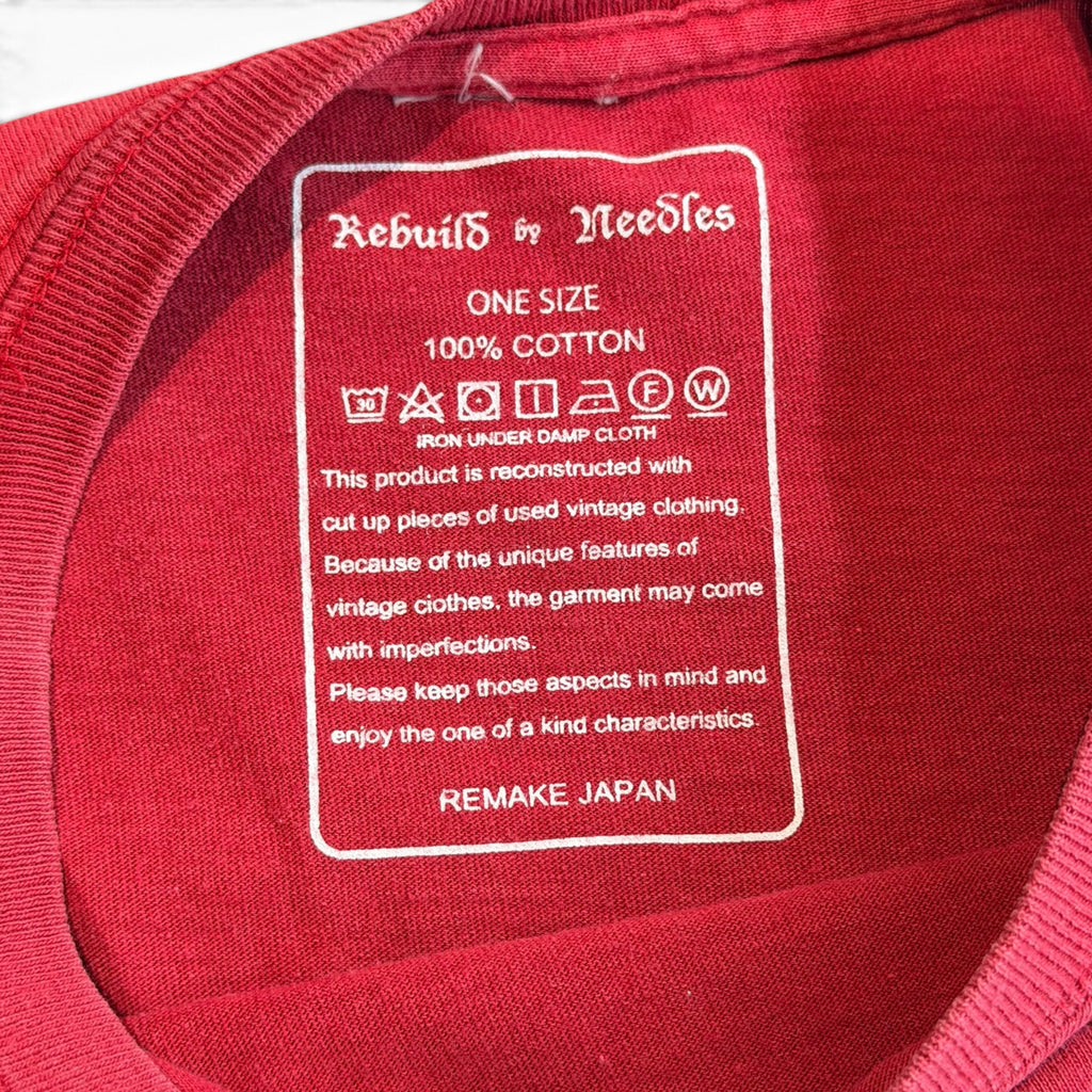 Needles Rebuild Nebraska 7 Cut T-Shirt