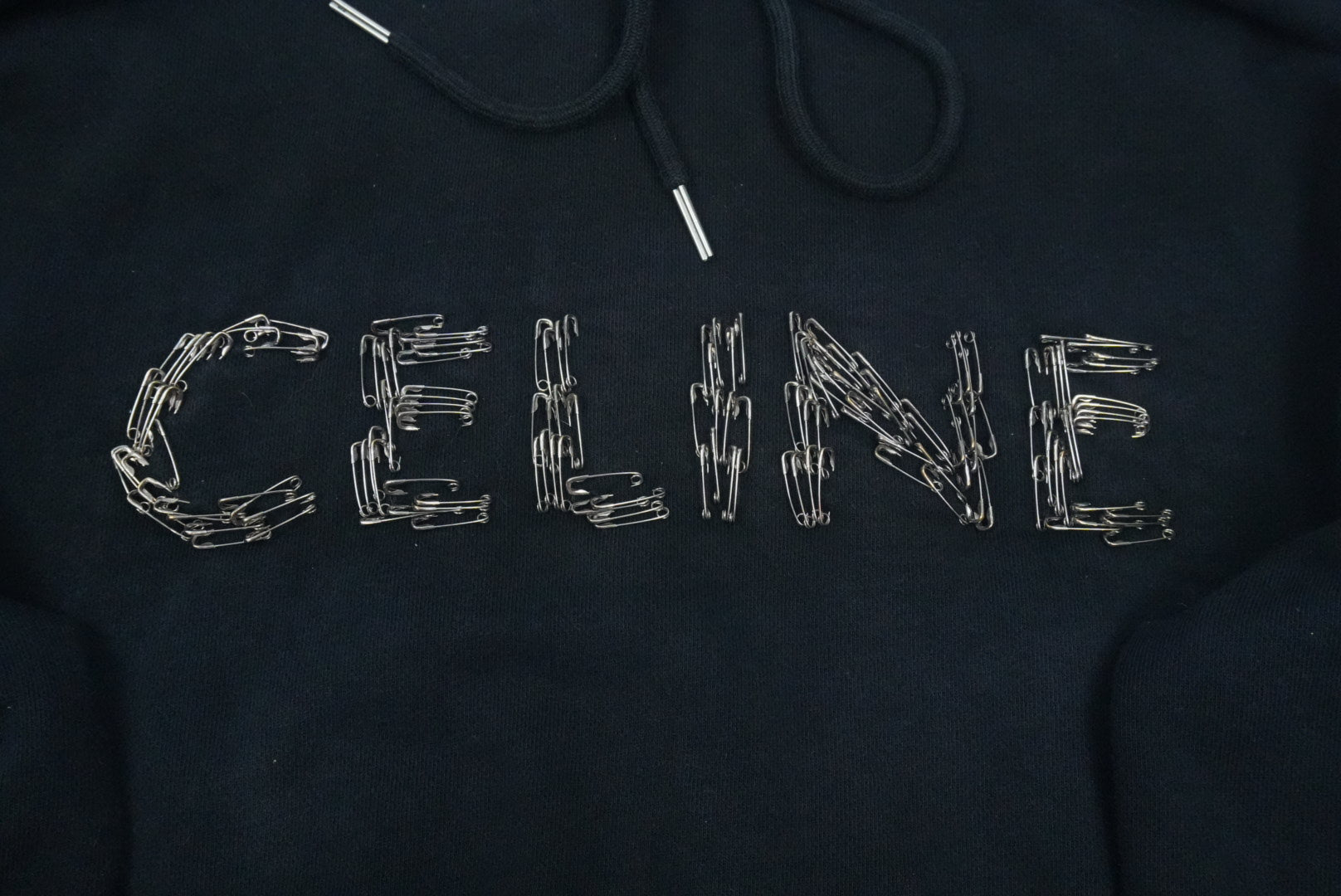 Celine SS22 Cosmic Cruiser safety pins hoodie